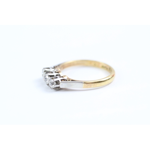 26 - 18ct gold three stone diamond ring (2.8g) Size K