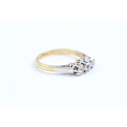 26 - 18ct gold three stone diamond ring (2.8g) Size K