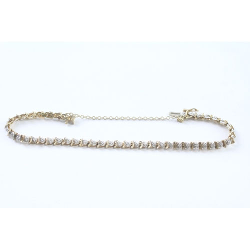 35 - 9ct gold diamond bracelet (6.3g) Size