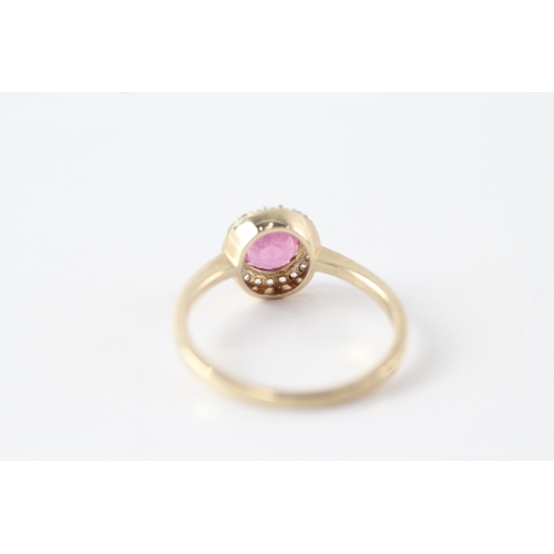 48 - 9ct gold white and pink gemstone halo ring (1.9g) Size L 1/2