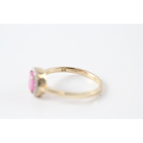 48 - 9ct gold white and pink gemstone halo ring (1.9g) Size L 1/2