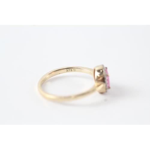 48 - 9ct gold white and pink gemstone halo ring (1.9g) Size L 1/2