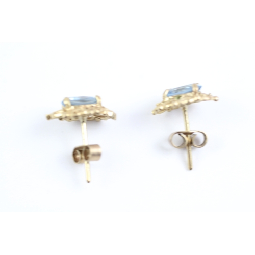 545 - 9ct gold blue gemstone stud earrings (1.7g) Size