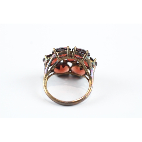 68 - 9ct gold garnet cluster cocktail ring (5.5g) Size N