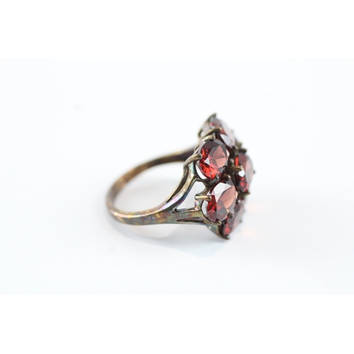 68 - 9ct gold garnet cluster cocktail ring (5.5g) Size N