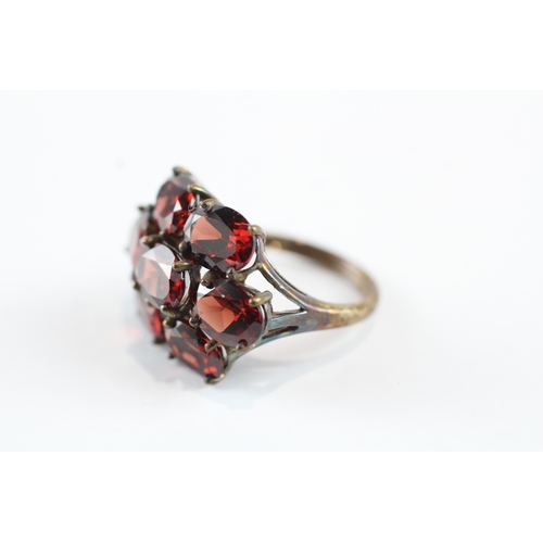 68 - 9ct gold garnet cluster cocktail ring (5.5g) Size N