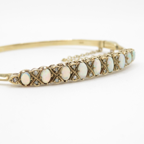 1 - 9ct Gold Diamond and Opal Bangle (9.4g)