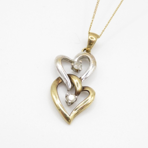 105 - 9ct gold diamond heart pendant on chain (2g)