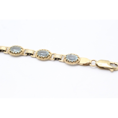 10 - 9ct gold blue gemstone bracelet (7.6g)