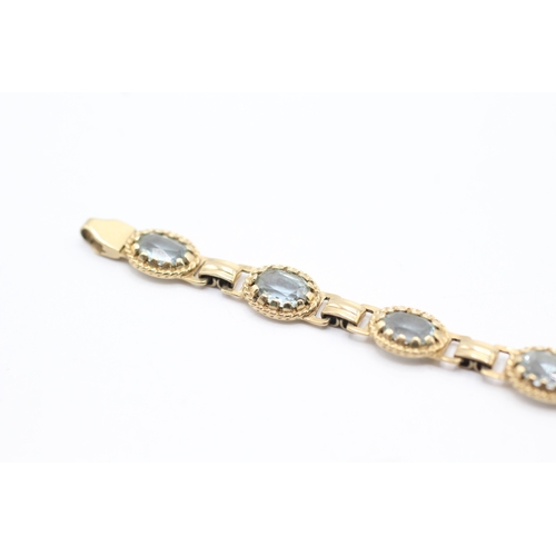 10 - 9ct gold blue gemstone bracelet (7.6g)