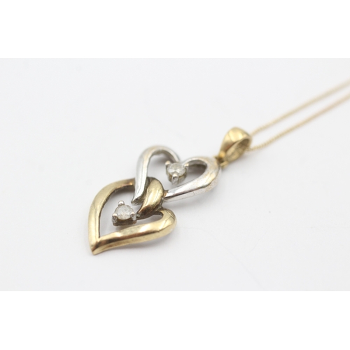 105 - 9ct gold diamond heart pendant on chain (2g)