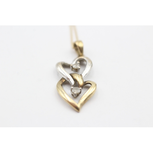 105 - 9ct gold diamond heart pendant on chain (2g)