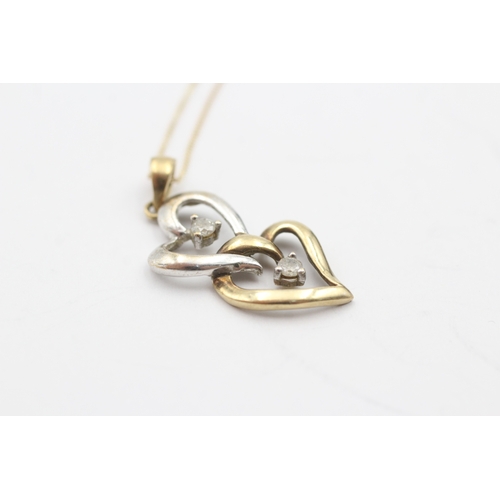 105 - 9ct gold diamond heart pendant on chain (2g)