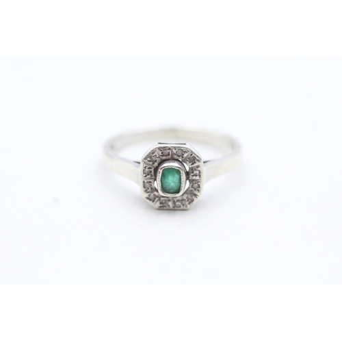 106 - 9ct gold diamond and green gemstone ring (2.7g) Size M