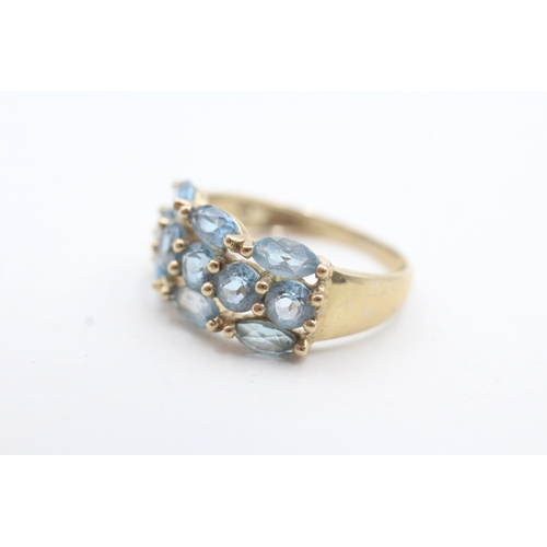 114 - 9ct gold blue gemstone cluster ring (3.2g) Size Q