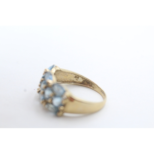 114 - 9ct gold blue gemstone cluster ring (3.2g) Size Q