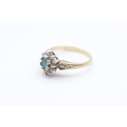 135 - 9ct gold blue gemstone and diamond halo ring (2.8g) Size M