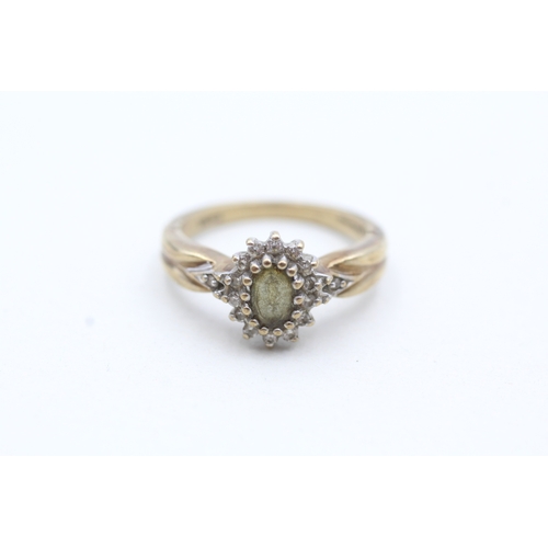 136 - 9ct gold green gemstone and diamond ring (3.3g) Size M