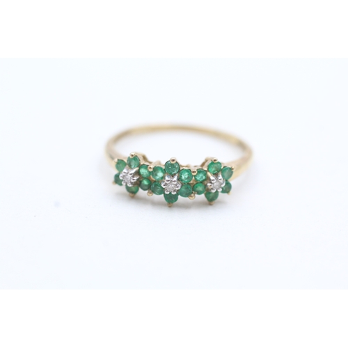 137 - 9ct gold emerald and diamond flower set ring (1.6g) Size Q