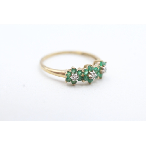 137 - 9ct gold emerald and diamond flower set ring (1.6g) Size Q