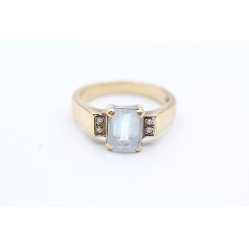 138 - 9ct gold blue gemstone and diamond framed ring (3.5g) Size N