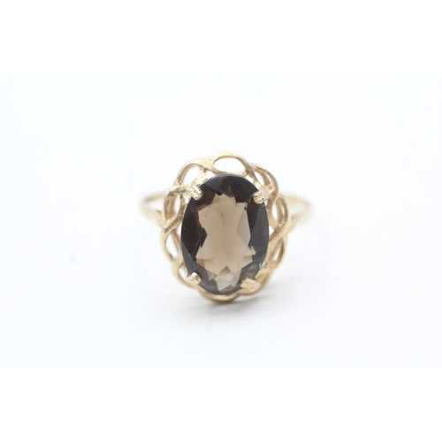 139 - 9ct gold smoky quartz frame ring (2.7g) Size R