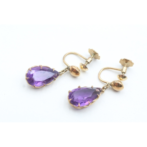 14 - 18ct gold amethyst pear drop screw back earrings (6.2g)