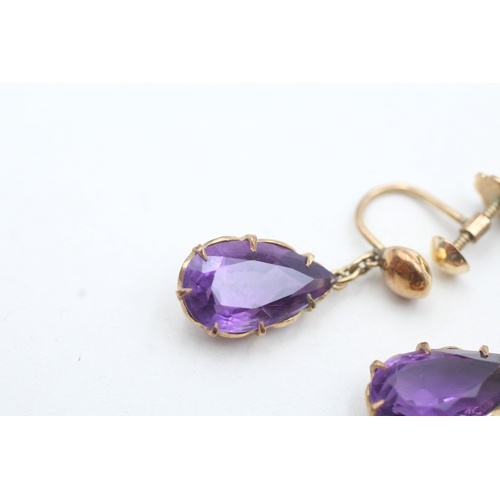 14 - 18ct gold amethyst pear drop screw back earrings (6.2g)