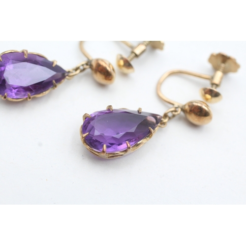 14 - 18ct gold amethyst pear drop screw back earrings (6.2g)