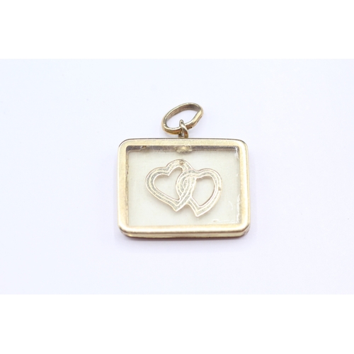 145 - 9ct gold twin heart pendant (2.9g)