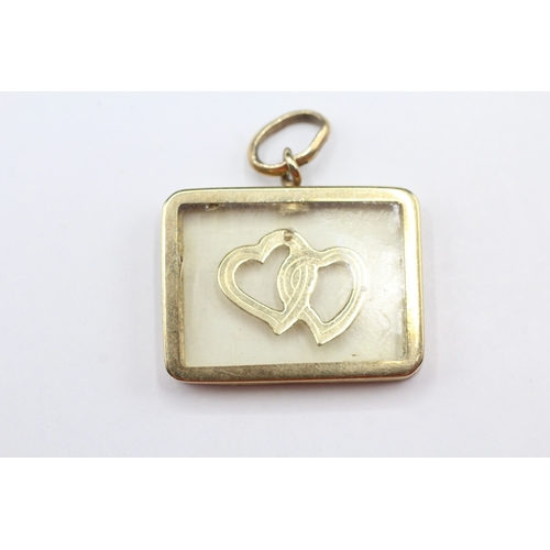 145 - 9ct gold twin heart pendant (2.9g)