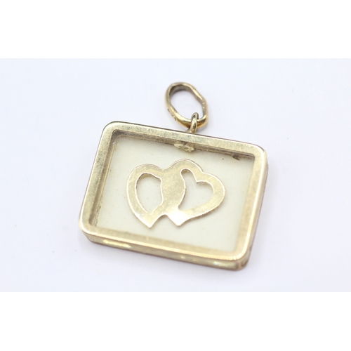 145 - 9ct gold twin heart pendant (2.9g)