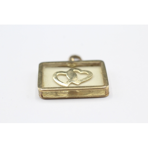 145 - 9ct gold twin heart pendant (2.9g)