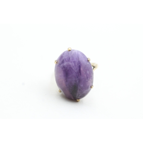 155 - 9ct gold purple gemstone ring (5.8g) Size L