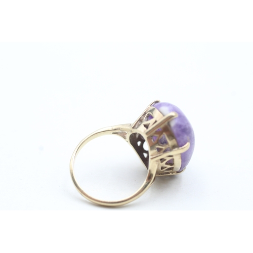 155 - 9ct gold purple gemstone ring (5.8g) Size L