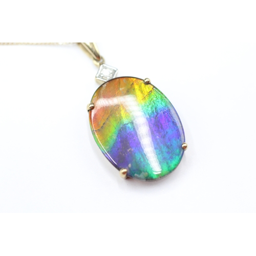 158 - 9ct gold diamond and ammolite triplet pendant on chain (3.8g)