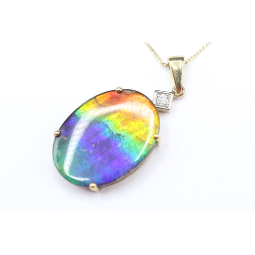 158 - 9ct gold diamond and ammolite triplet pendant on chain (3.8g)