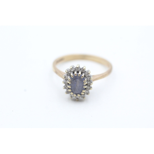 161 - 9ct gold blue gemstone and diamond oval set ring (2.4g) Size M