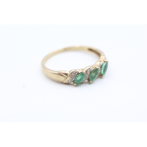 165 - 9ct gold diamond and green gemstone ring (2.2g) Size U