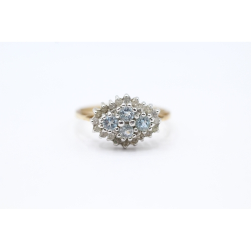 166 - 9ct gold light blue gemstone and diamond ring (2.4g) Size Q