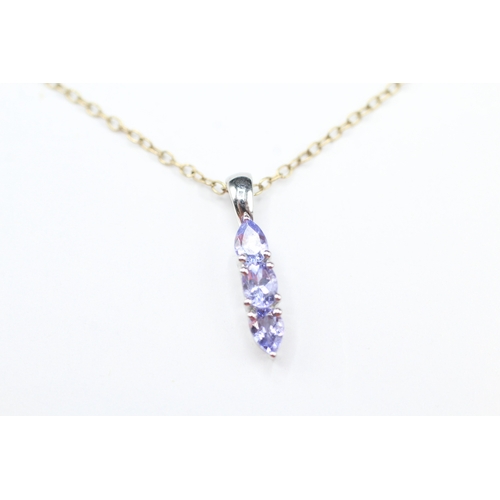 179 - 14ct gold tanzanite pendant on 9ct gold chain (1.7g)