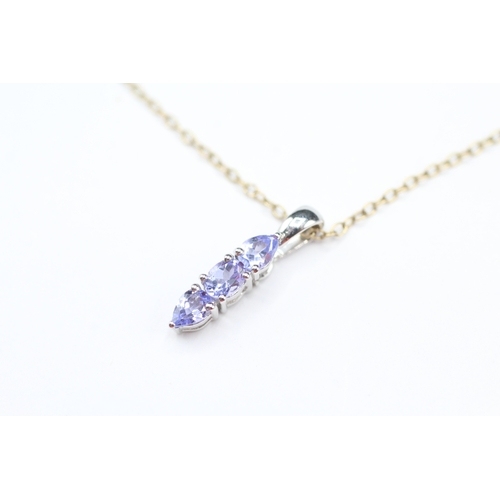 179 - 14ct gold tanzanite pendant on 9ct gold chain (1.7g)