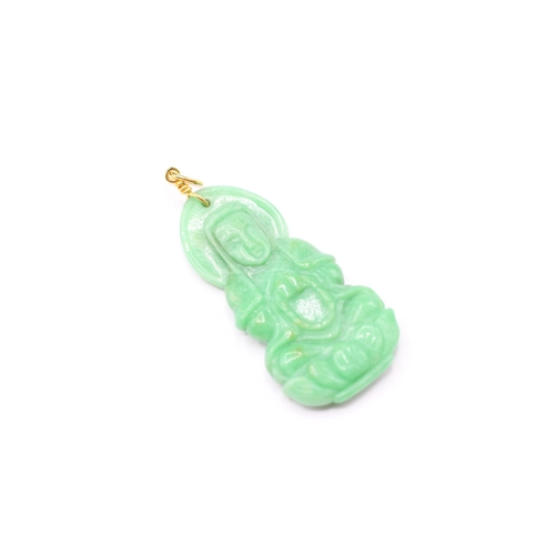 187 - 14ct gold carved jade pendant with gold bail (6.6g)