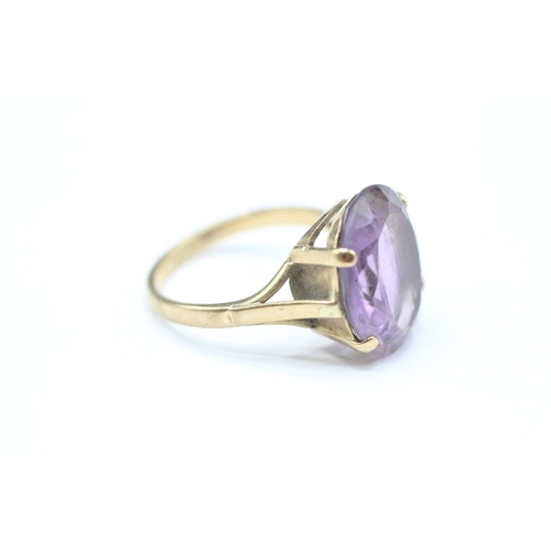 193 - 9ct gold amethyst single stone ring (3.3g) Size K