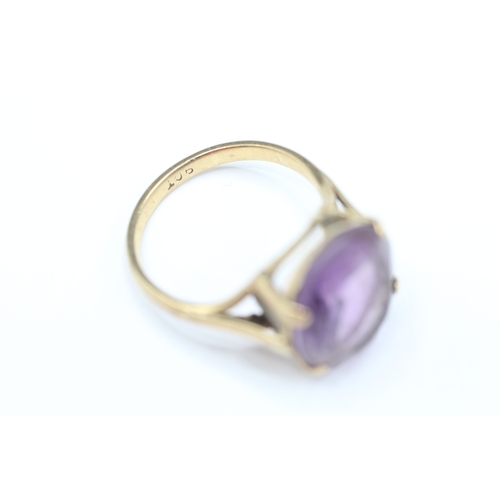 193 - 9ct gold amethyst single stone ring (3.3g) Size K