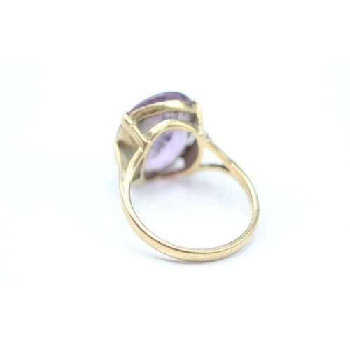 193 - 9ct gold amethyst single stone ring (3.3g) Size K