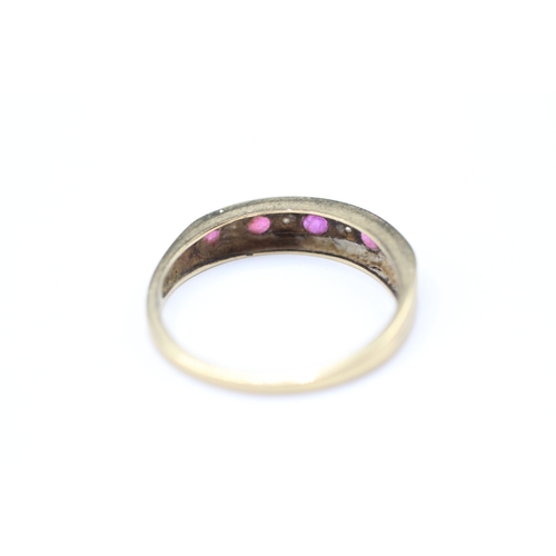 196 - 9ct gold flush set pink gemstone and diamond ring (1.8g) Size O 1/2