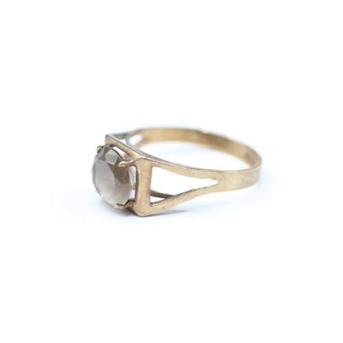 198 - 9ct gold smoky quartz single stone ring (1.8g) Size L