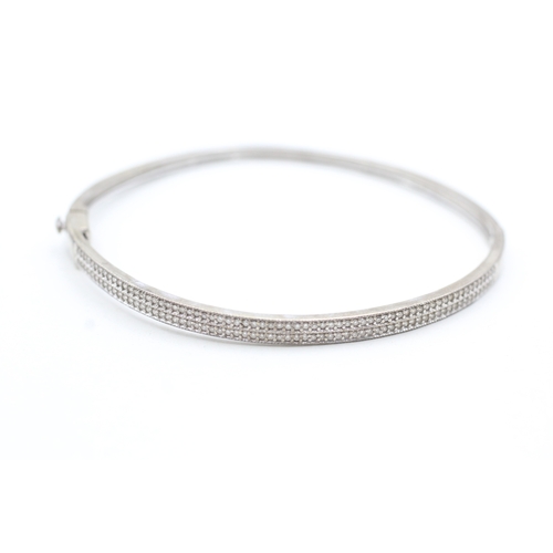 201 - 9ct gold diamond two row bangle (9.2g)