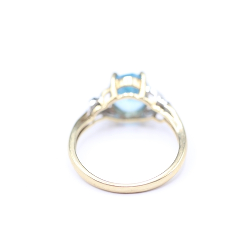 206 - 9ct gold blue gemstone and diamond twist ring (2.9g) Size Q